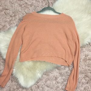 pastel orange sweater